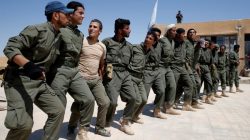 FILE PHOTO: Graduates of a U.S.-trained police force, which expects to be deployed in Raqqa, dance during a graduation ceremony near Ain Issa village, north of Raqqa, Syria, June 17, 2017. REUTERS/Goran Tomasevic/File Photo