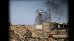 Al-Hadba minaret at the Grand Mosque is seen through a building window in the old city of Mosul, Iraq June 1, 2017. REUTERS/Alaa Al-Marjani
