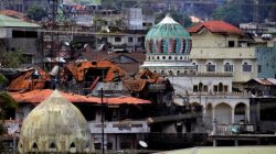 Damaged buildings and houses are seen as government forces continue their assault against insurgents from the Maute group, who have taken over large parts of the Marawi City, Philippines June 22, 2017. REUTERS/Romeo Ranoco