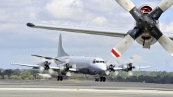 FILE PHOTO - A Royal Australian Air Force (RAAF) Orion aircraft (back) prepares to take off from RAAF Base Pearce near Perth April 6, 2014. REUTERS/Richard Polden