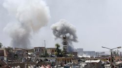 Smoke billows from the Islamic State militants positions after an artillery attack by Iraqi forces. REUTERS/Erik De Castro