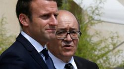 French President Emmanuel Macron walks next to Foreign Minister Jean-Yves Le Drian after a meeting about Qatar crisis at the Elysee Place in Paris France, June 21, 2017. REUTERS/Gonzalo Fuentes