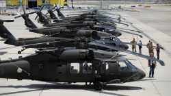 American Black Hawk helicopters are parked in a row during a dress rehearsal of the arrival ceremony which will be held to welcome U.S. President Donald Trump upon his arrival, at Ben Gurion International Airport in Lod, Israel May 21, 2017. REUTERS/Amir Cohen