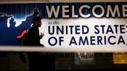 An international passenger arrives at Washington Dulles International Airport after the U.S. Supreme Court granted parts of the Trump administration's emergency request to put its travel ban into effect later in the week pending further judicial review, in Dulles, Virginia, U.S., June 26, 2017. REUTERS/James Lawler Duggan