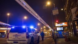 FILE PHOTO - Chicago police officer investigate a crime scene of a gunshot victim in Chicago, Illinois, United States, July 5, 2015. REUTERS/Jim Young