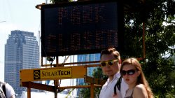 A "Park Closed" sign is seen at an entrance to Liberty State Park during a partial state government shutdown in Jersey City, New Jersey U.S., July 3, 2017.