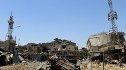 Destroyed building and cars in the Old City. REUTERS/Alaa Al-Marjani