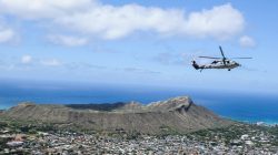An MH-60S Sea Hawk helicopter participates in a helicopter training exercise over Diamond Head crater on the Hawaiian island of Oahu in this July 3, 2014 handout photo obtained by Reuters July 6, 2017. Ensign Joseph Pfaff/U.S. Navy/Handout via REUTERS