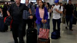 Commuters wait for track announcements at New York's Pennsylvania Station which began track repairs causing massive disruptions to commuters in New York City, U.S., July 10, 2017.