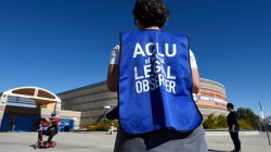 FILE PHOTO - A member of the ACLU observes a polling station during voting in the 2016 presidential election at Desert Pines High School in Las Vegas, Nevada, U.S. on November 8, 2016. REUTERS/David Becker/File Photo