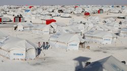 FILE PHOTO: Children walk at a camp for people displaced from fighting in the Islamic State stronghold of Raqqa, in Ain Issa, Syria June 14, 2017. REUTERS/Goran Tomasevic/File Photo