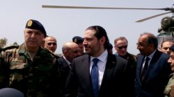 FILE PHOTO: Lebanese Prime Minister Saad al-Hariri arrives with Army Commander General Joseph Aoun (L) at the United Nations Interim Force in Lebanon (UNIFIL) headquarters in Naqoura, near the Lebanese-Israeli border, southern Lebanon April 21, 2017. REUTERS/Ali Hashisho/File Photo