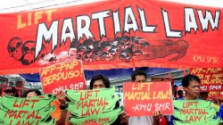 Activists display placards calling for lifting of martial law in the southern Philippines, as Philippine President Rodrigo Duterte has asked the Philippine Congress to extend the implementation of martial law in the island of Mindanao until the end of the year, to allow the armed forces to quell Islamist militancy in parts of the southern island, during a protest outside the presidential palace in Manila, Philippines July 18, 2017. REUTERS/Romeo Ranoco