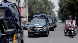 Police vehicles patrol the streets, after suspected gang members were killed on Thursday in a gun battle with Mexican marines in Mexico City, Mexico, July 21, 2017. REUTERS/Henry Romero