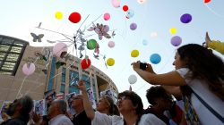 Journalists and press freedom activists release balloons during a demonstration in solidarity with the members of the opposition newspaper Cumhuriyet who were accused of supporting a terrorist group outside a courthouse, in Istanbul, Turkey, July 24, 2017.