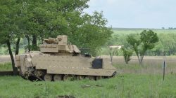 U.S. Army Soldiers, assigned to 1st Armored Brigade Combat Team, 1st Infantry Division, fire a TOW missile from a Bradley Fighting Vehicle during training at Fort Riley, Kansas, May 18, 2016. U.S. Army photo by Capt. Jonathan Camire
