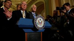 Senate Majority Leader Mitch McConnell, accompanied by Senator John Cornyn (R-TX) and Senator John Barrasso (R-WY), speaks with reporters following the successful vote to open debate on a health care bill on Capitol Hill in Washington, U.S., July 25, 2017. REUTERS/Aaron P. Bernstein