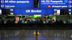 FILE PHOTO: UK Border control is seen in Terminal 2 at Heathrow Airport in London June 4, 2014. REUTERS/Neil Hall/File Photo