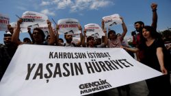 Press freedom activists shout slogans during a demonstration in solidarity with the jailed members of the opposition newspaper Cumhuriyet outside a courthouse, in Istanbul, Turkey, July 28, 2017. The banner reads: "To hell with despotism. Long live freedom".REUTERS/Murad Sezer