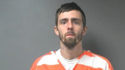 Inmate Brady Andrew Kilpatrick shown in this undated booking photo provided July 31, 2017, is the last remaining inmate at large after 11 of 12 prison escapees have been recaptured after a mass jailbreak at the Walker County Jail, near Birmingham, Alabama, according to authorities. Courtesy Walker County