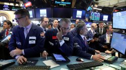 Traders work on the floor of the New York Stock Exchange (NYSE) in New York, U.S., July 19, 2017. REUTERS/Brendan McDermid