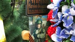 A portrait of Russian private military contractor Yevgeni Chuprunov is seen at his grave in Novomoskovsk, in Tula region, Russia June 1, 2017. REUTERS/Maria Tsvetkova