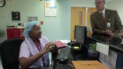 Doctor Michelle Berkely (L) and Chief Financial Officer Tim Lessing of the Juan F. Luis Hospital and Medical Center, talk to Reuters in Christiansted, on the outskirts of St Croix, U.S. Virgin Islands June 29, 2017. Picture taken June 29, 2017. REUTERS/Alvin Baez
