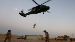 FILE PHOTO: A U.S. Navy Corpsman and U.S. soldier take part in a helicopter Medevac exercise in Helmand province, Afghanistan, July 6, 2017. REUTERS/Omar Sobhani/File Photo
