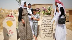 Yazidis visit a cemetery during a commemoration of the third anniversary of the Yazidi genocide in Sinjar region, Iraq August 3, 2017. REUTERS/Suhaib Salem