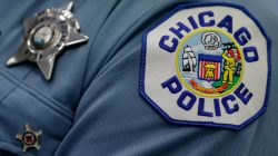 A Chicago police officer attends a news conference announcing the department's plan to hire nearly 1,000 new police officers in Chicago, Illinois, U.S. on September 21, 2016.