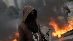 Demonstrators build fire barricades while rallying against Venezuela's President Nicolas Maduro's government in Caracas, Venezuela, August 4,