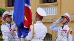 Honour guards raise an Association of Southeast Asian Nations (ASEAN) flag at a flag-raising ceremony to mark the 50th anniversary of the regional group at Vietnam's Ministry of Foreign Affairs in Hanoi August 8, 2017. REUTERS/Kham