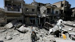 A member of Iraqi federal police patrols in the destroyed Old City of Mosul, Iraq August 7, 2017. REUTERS/Suhaib Salem