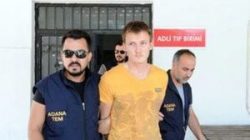 Russian national Renat Bakiev, a suspected Islamic State militant who allegedly planned to use a drone to bring down a U.S. plane at the Incirlik air base, is escorted by police officers as he arrives to a hospital for a medical check in the city of Adana, Turkey, August 10, 2017. Dogan News Agency via REUTERS