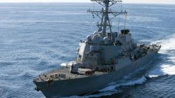 FILE PHOTO - The guided-missile destroyer USS John S. McCain approaches the aircraft carrier USS George Washington for a fueling at sea in this December 5, 2010 handout photo courtesy of the U.S. Navy. REUTERS/U.S. Navy/Mass Communication Specialist Seaman Cheng S. Yang/Handout