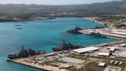 FILE PHOTO: Navy vessels are moored in port at the U.S. Naval Base Guam at Apra Harbor, Guam March 5, 2016. Major Jeff Landis,USMC (Ret.)/Naval Base Guam/Handout/File Photo via REUTERS