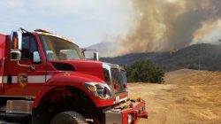 FILE PHOTO: Rose fire burns near Lake Elsinore in Western Riverside County, California, U.S. in this undated photo obtained by Reuters July 31, 2017. Riverside County Fire Department via Facebook/Handout via REUTERS.