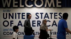 FILE PHOTO - International passengers arrive at Washington Dulles International Airport after the U.S. Supreme Court granted parts of the Trump administration's emergency request to put its travel ban into effect later in the week pending further judicial review, in Dulles, Virginia, U.S., June 26, 2017. REUTERS/James Lawler Duggan