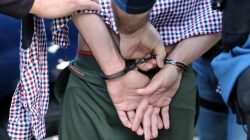 U.S. Immigration and Customs Enforcement (ICE) agents arrest an immigrant in San Clemente, California,
