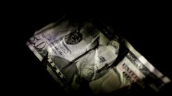 FILE PHOTO: A U.S. Dollar note is seen in this June 22, 2017 illustration photo. REUTERS/Thomas White/Illustration/File Photo