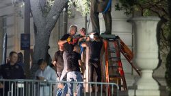 Workers remove Confederate Postmaster General John Reagan statue from the south mall of the University of Texas in Austin, Texas, U.S., August 21, 2017.