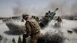 FILE PHOTO: U.S. Army soldiers from the 2nd Platoon, B battery 2-8 field artillery, fire a howitzer artillery piece at Seprwan Ghar forward fire base in Panjwai district, Kandahar province southern Afghanistan, June 12, 2011.