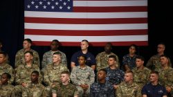 Military personnel watch as U.S. President Donald Trump announces his strategy for the war in Afghanistan during an address to the nation from Fort Myer, Virginia, U.S., August 21, 2017. REUTERS/Joshua Roberts