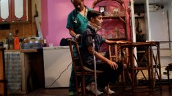 Jofre Rodriguez, 18, who was injured during a protest against Venezuela's President Nicolas Maduro's government, poses for a photograph at his home in Turmero, Venezuela, August 11, 2017. REUTERS/Ueslei Marcelino