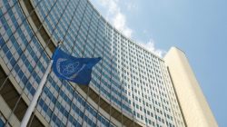 FILE PHOTO: The flag of the International Atomic Energy Agency (IAEA) flies in front of IAEA's headquarters during a board of governors meeting in Vienna, Austria June 12, 2017. REUTERS/Heinz-Peter Bader