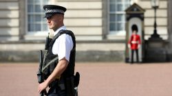 A police officer patrols within the grounds of Buckingham Palace in London, Britain August 26, 2017. REUTERS/Paul Hackett