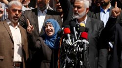 Hamas Chief Ismail Haniyeh (R) and Hamas Gaza leader Yehya Al-Sinwar (L) attend a news conference as the wife of slain senior Hamas militant Mazen Fuqaha gestures, in Gaza City May 11, 2017.