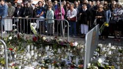 FILE PHOTO: People attend a moment of silence to commemorate the victims of Friday's stabbings at the Turku Market Square in Turku, Finland August 20, 2017. Lehtikuva/Vesa Moilanen via REUTERS