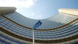 FILE PHOTO: The flag of the International Atomic Energy Agency (IAEA) flies in front of IAEA's headquarters during a board of governors meeting in Vienna, Austria June 12, 2017. REUTERS/Heinz-Peter Bader
