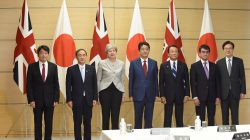 British Prime Minister Theresa May (3rd L) and members of Japan's National Security Council pose for the media prior to their meeting at Japan's Prime Minister Shinzo Abe's official residence in Tokyo on August 31, 2017. (L-R) Defense Minister Itsunori Onodera, Chief Cabinet Secretary Yoshihide Suga, British Prime Minister Theresa May, Prime Minister Shinzo Abe, Deputy Prime Minister and Finance Minister Taro Aso, Foreign Minister Taro Kono, and Shotaro Yachi, head of the National Security Council. REUTERS/Kazuhiro Nogi/Pool